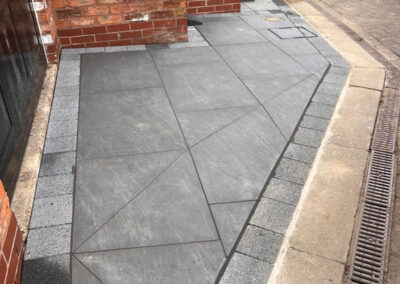 Outdoor porcelain by Didsbury Driveways